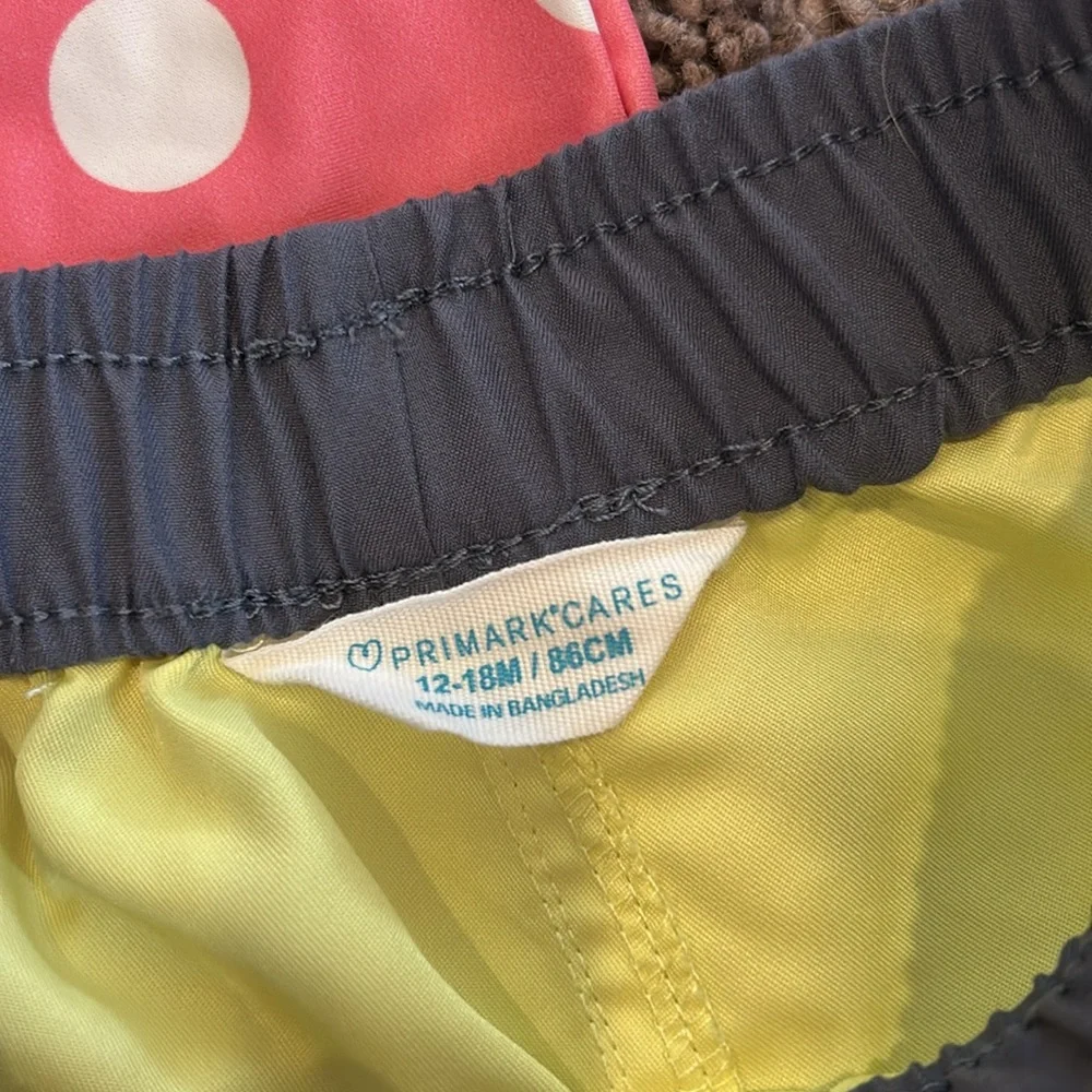 Pink polka dot one piece and yellow swim trunks 12/18m coordinating twin set